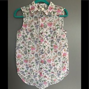 Sheer floral sleeveless blouse